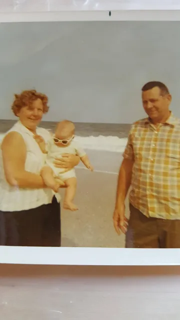 Early boot sequence: me and my grandparents at the beach.
